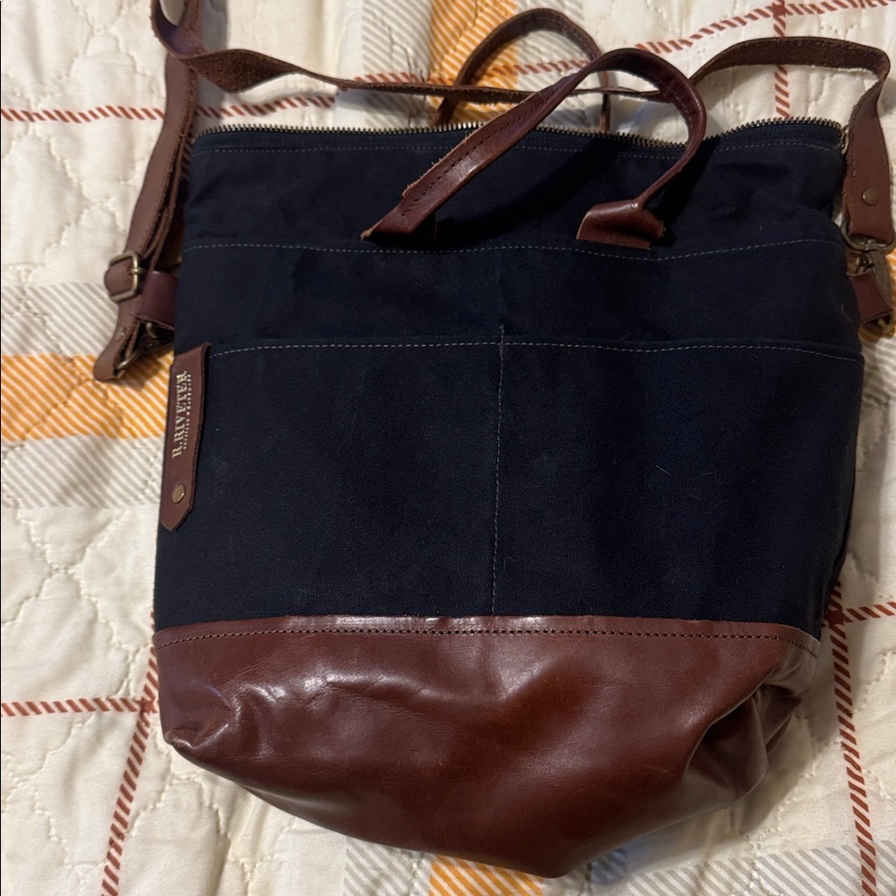 R Riveter Black canvas and brown leather .